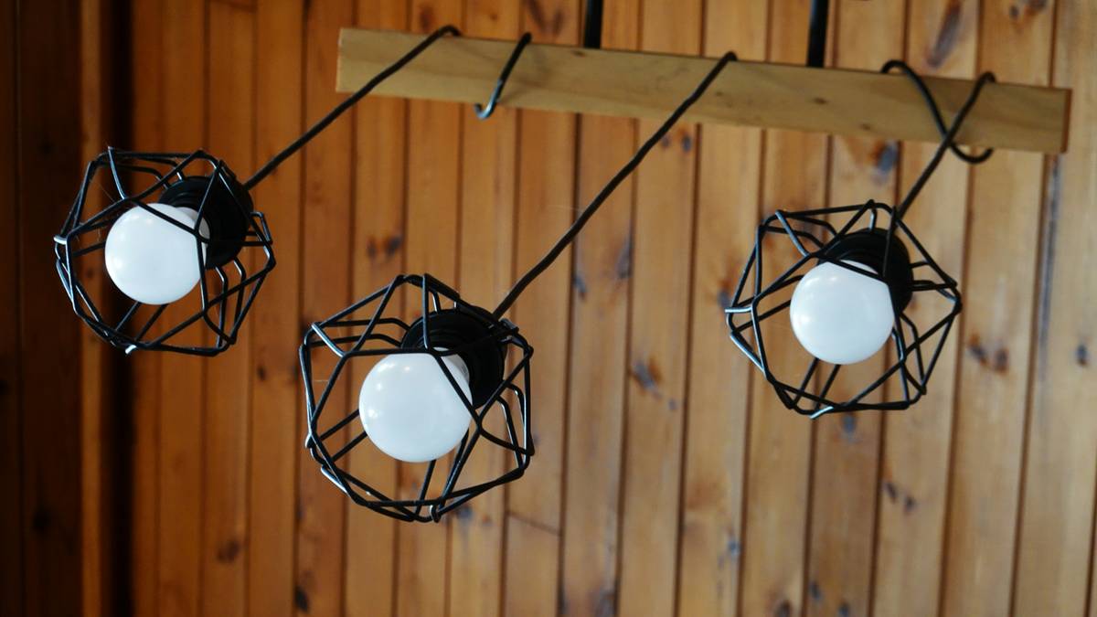 Dual-circuit residential track lighting systems in a contemporary dining area allowing separate control of ambient and accent lighting