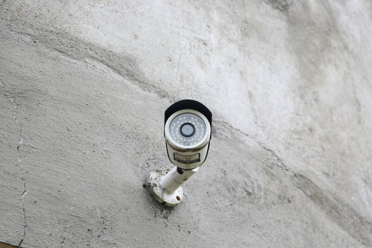 Professional track lighting home depot installation showing laser-level alignment and clean wiring